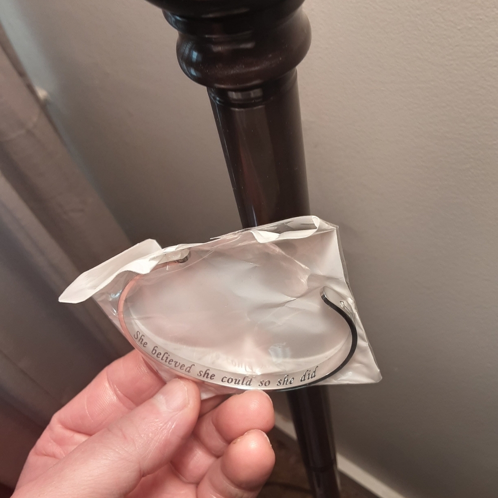 Metal bangle bracelet "She believed"